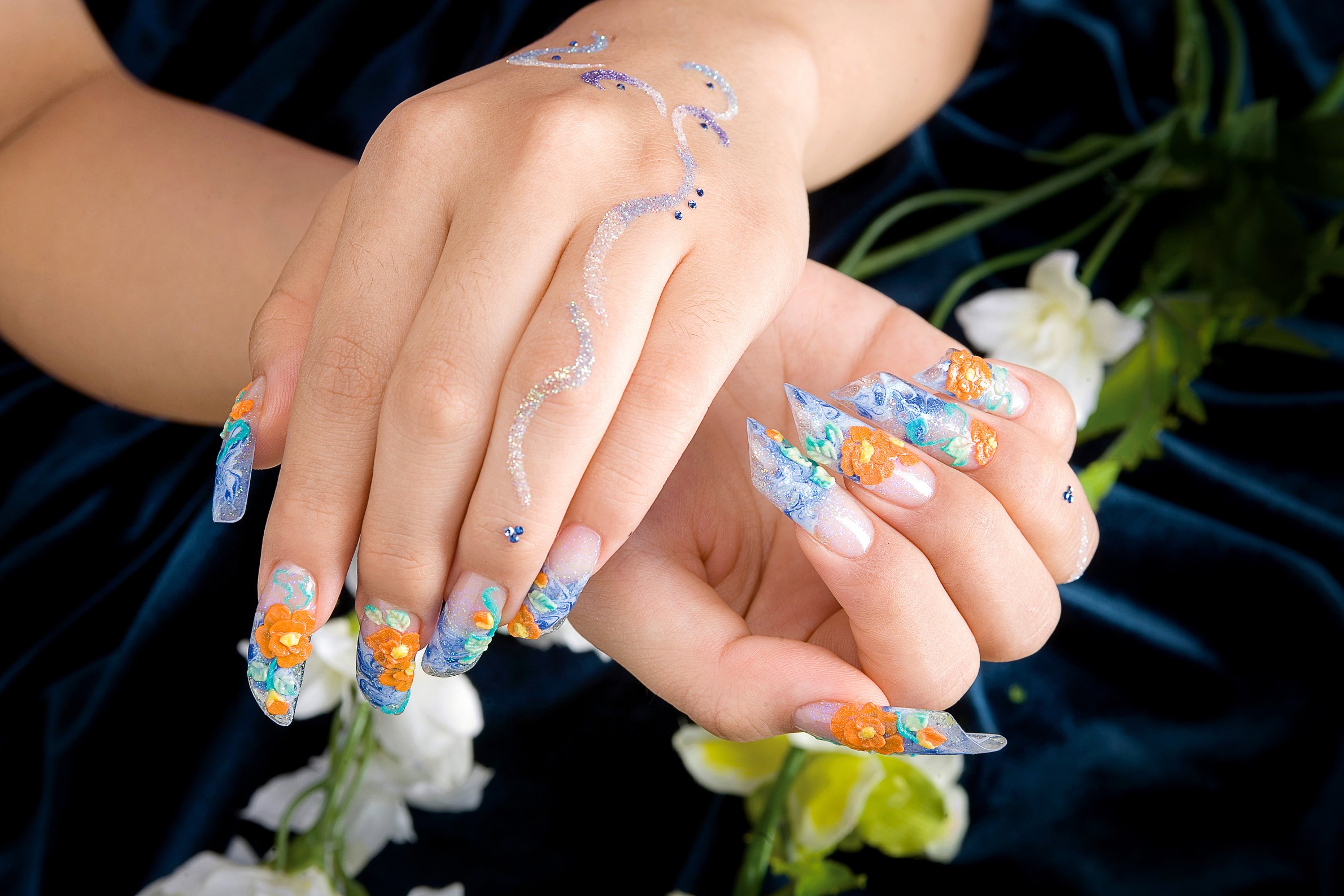 a woman's nail, designed with nail art